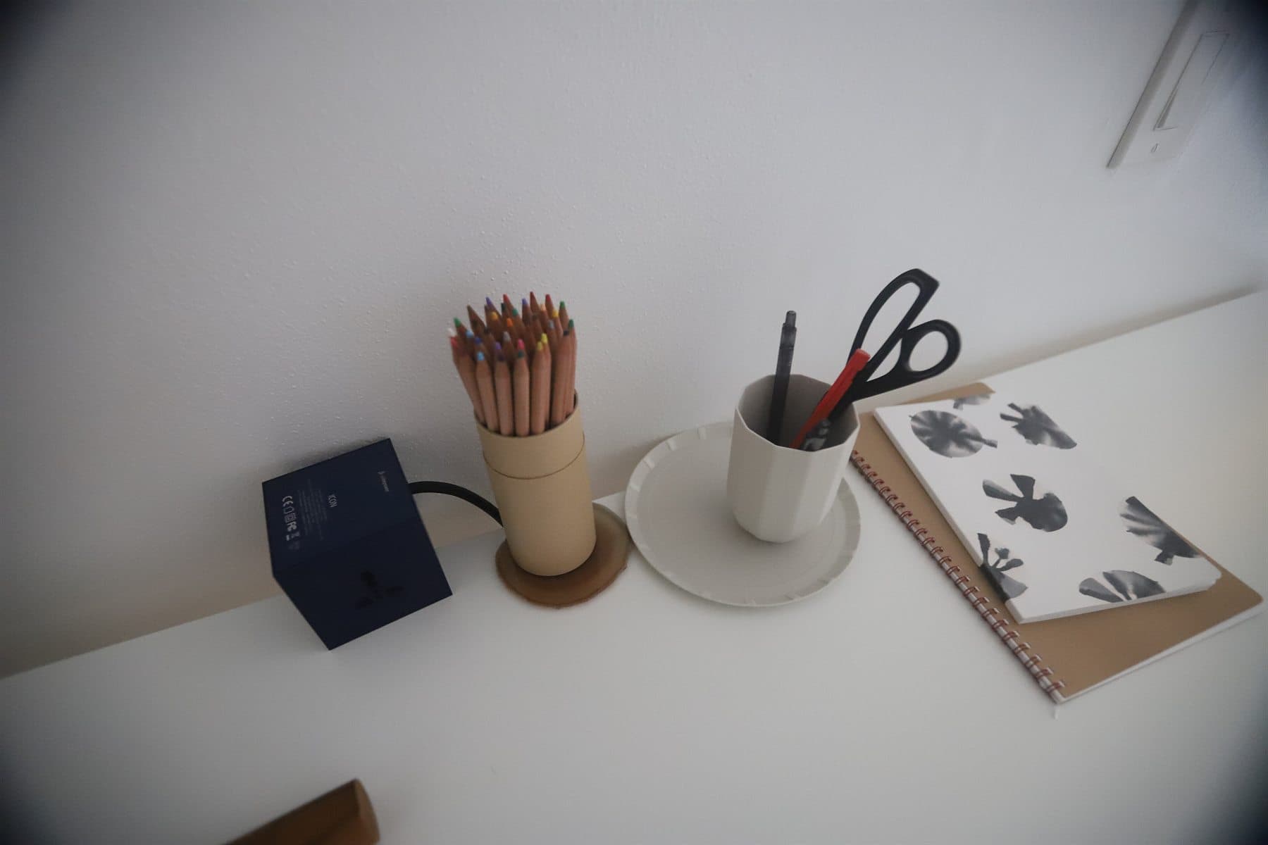 Minimalist desk with colorful pencils